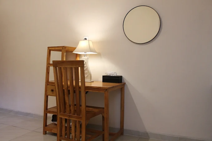 Comfortable outdoor seating area surrounded by greenery